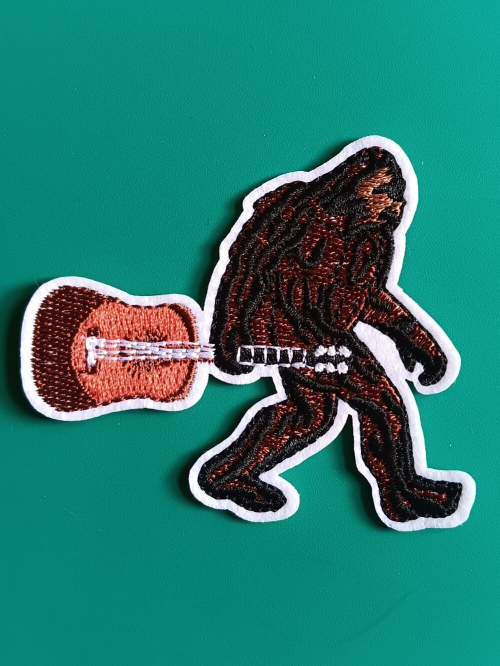 Backwoods Bigfoot Guitar Embroidered Iron On Patch, Cryptid Cabin Musician